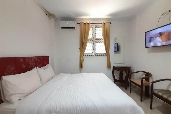 Imagen de la habitación del Hotel O Homestay Pakmuklis Syariah 2 Near Taman Mini Lhokseumawe. Foto 15