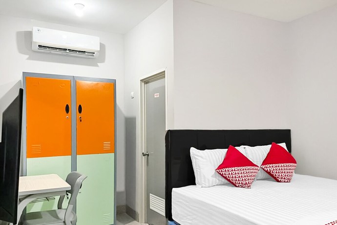 Imagen de la habitación del Hotel O Kbr Home. Foto 2