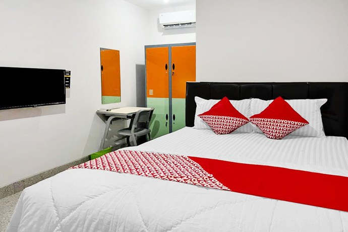 Imagen de la habitación del Hotel O Kbr Home. Foto 4