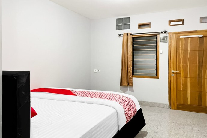 Imagen de la habitación del Hotel O Kbr Home. Foto 5