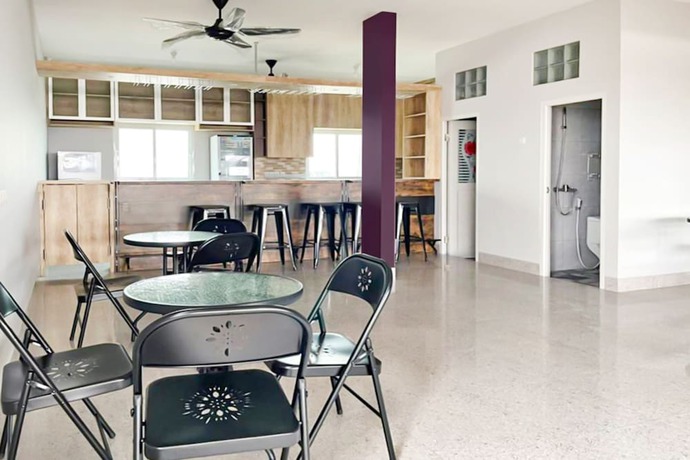 Imagen de los interiores del Hotel O Kbr Home. Foto 17