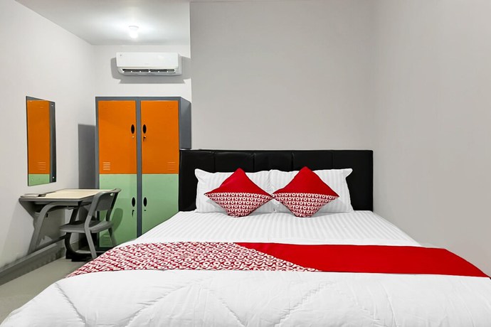 Imagen de la habitación del Hotel O Kbr Home. Foto 8