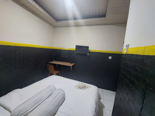 Imagen de la habitación del Hotel O Mahendra HomestayNearTaman Wisata Bukit Rurukan. Foto 2
