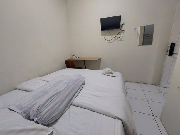 Imagen de la habitación del Hotel O Mahendra HomestayNearTaman Wisata Bukit Rurukan. Foto 8