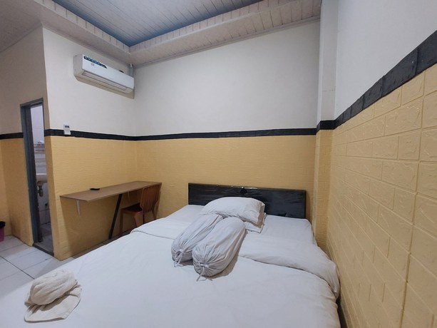 Imagen de la habitación del Hotel O Mahendra HomestayNearTaman Wisata Bukit Rurukan. Foto 11