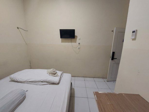 Imagen de la habitación del Hotel O Mahendra HomestayNearTaman Wisata Bukit Rurukan. Foto 12