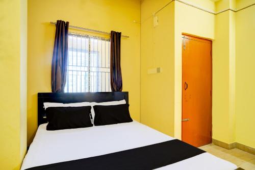 Imagen de la habitación del Hotel O Modern Home. Foto 19