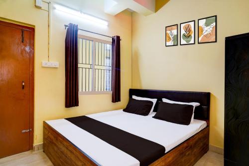 Imagen de la habitación del Hotel O Modern Home. Foto 20