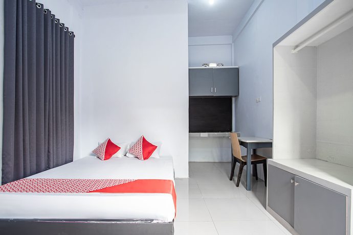 Imagen de la habitación del Hotel O Owo Guest House Syariah. Foto 6