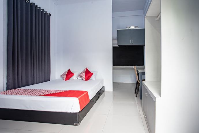 Imagen de la habitación del Hotel O Owo Guest House Syariah. Foto 7