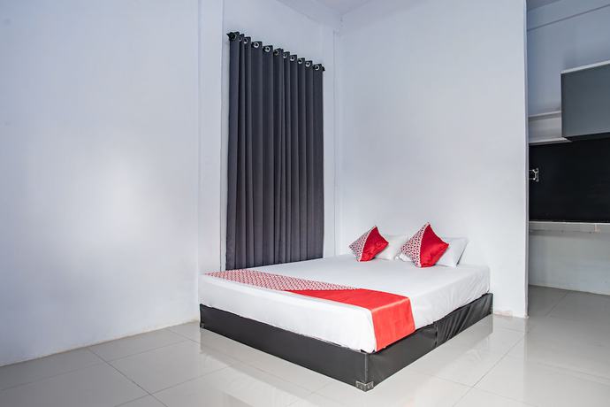Imagen de la habitación del Hotel O Owo Guest House Syariah. Foto 8