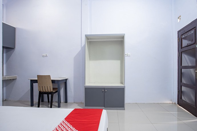 Imagen de la habitación del Hotel O Owo Guest House Syariah. Foto 10