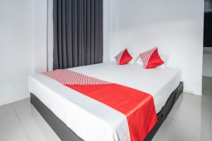 Imagen de la habitación del Hotel O Owo Guest House Syariah. Foto 11