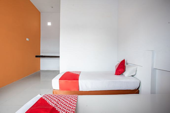 Imagen de la habitación del Hotel O Owo Guest House Syariah. Foto 12