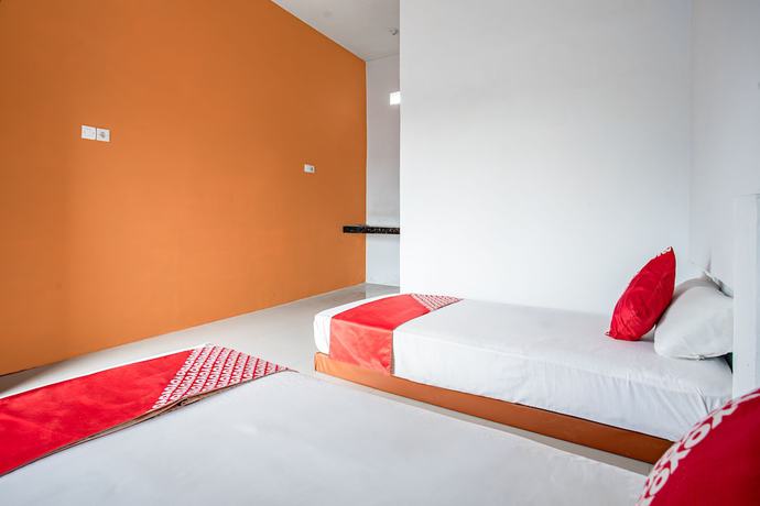 Imagen de la habitación del Hotel O Owo Guest House Syariah. Foto 13