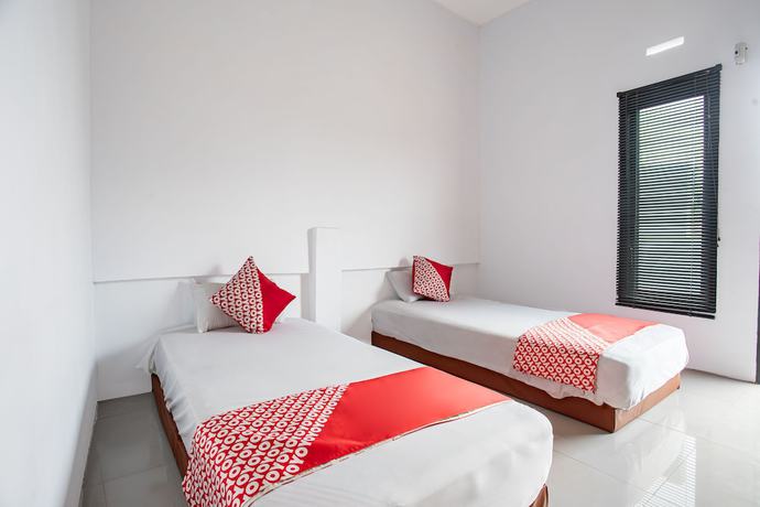 Imagen de la habitación del Hotel O Owo Guest House Syariah. Foto 14