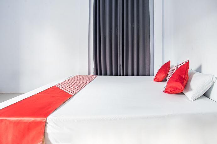 Imagen de la habitación del Hotel O Owo Guest House Syariah. Foto 17