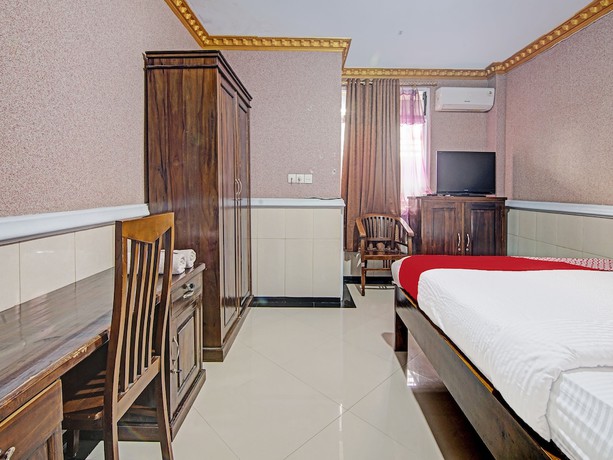 Imagen de la habitación del Hotel O Padang City Center Near Gunung Padang. Foto 12