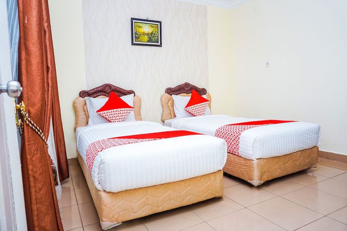 Imagen de la habitación del Hotel O Padang City Center Near Pantai Padang. Foto 7