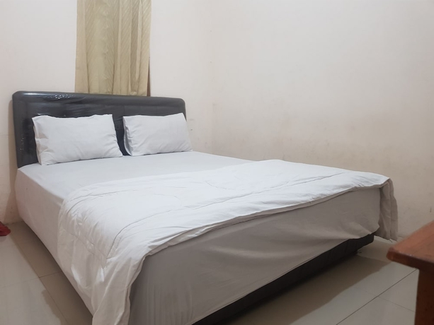 Imagen de la habitación del Hotel O Peaceful Residence. Foto 2