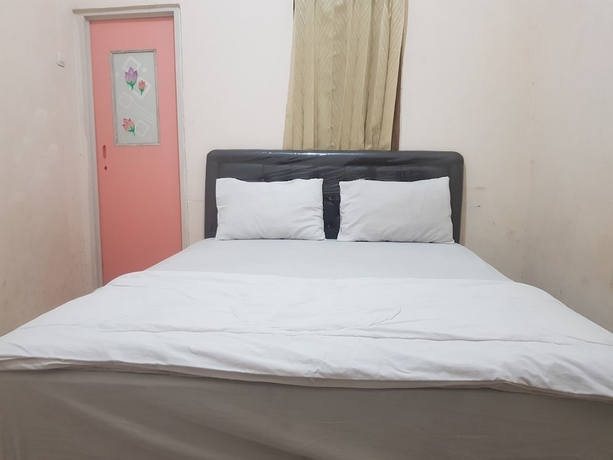Imagen de la habitación del Hotel O Peaceful Residence. Foto 3