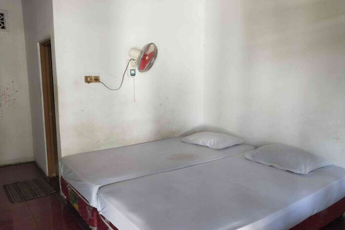 Imagen de la habitación del Hotel O Penginapan Mekar Sari Near PT. Lombok Menara Energygas. Foto 24