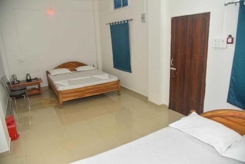 Imagen de la habitación del Hotel O Pradip Guest House. Foto 7