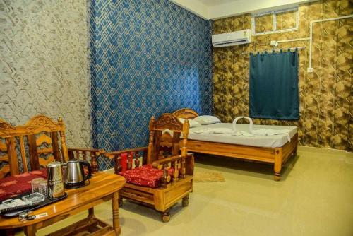Imagen de la habitación del Hotel O Pradip Guest House. Foto 8