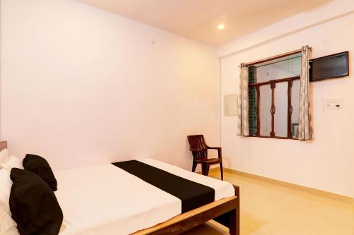 Imagen de la habitación del Hotel O Rajpoot. Foto 19