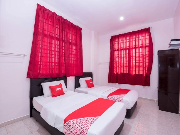 Imagen de la habitación del Hotel O Rg Motel. Foto 14