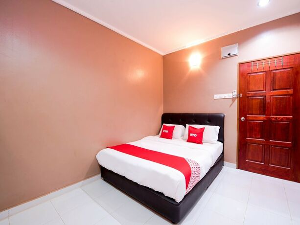 Imagen de la habitación del Hotel O Rg Motel. Foto 16