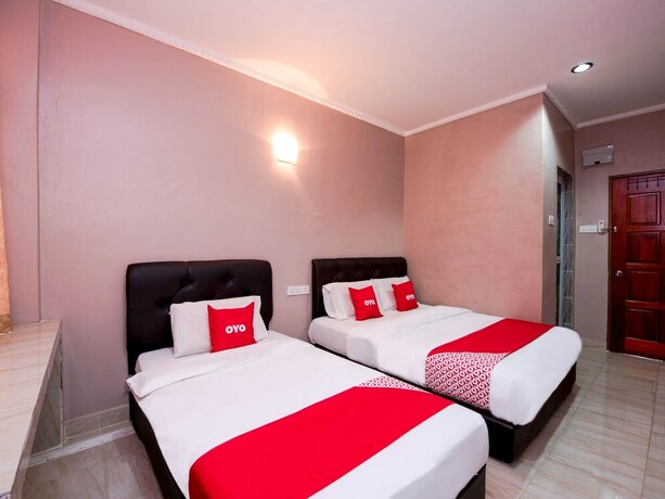 Imagen de la habitación del Hotel O Rg Motel. Foto 17