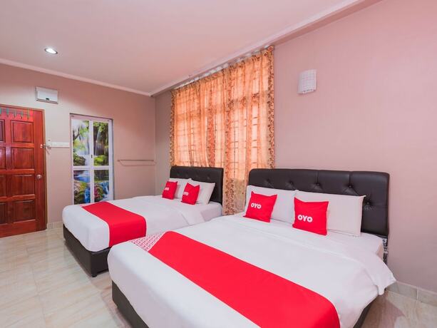 Imagen de la habitación del Hotel O Rg Motel. Foto 19
