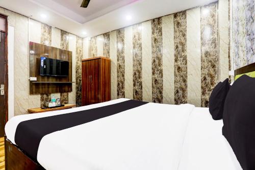 Imagen de la habitación del Hotel O Royal Stone. Foto 10