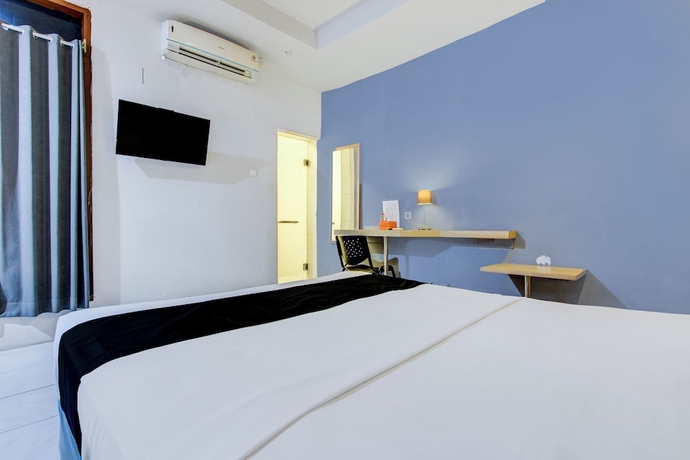 Imagen de la habitación del Hotel O Tegal near near Pacific Mall Tegal formerly Hugo Suites Family. Foto 2