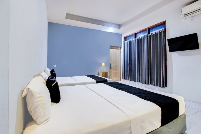 Imagen de la habitación del Hotel O Tegal near near Pacific Mall Tegal formerly Hugo Suites Family. Foto 3