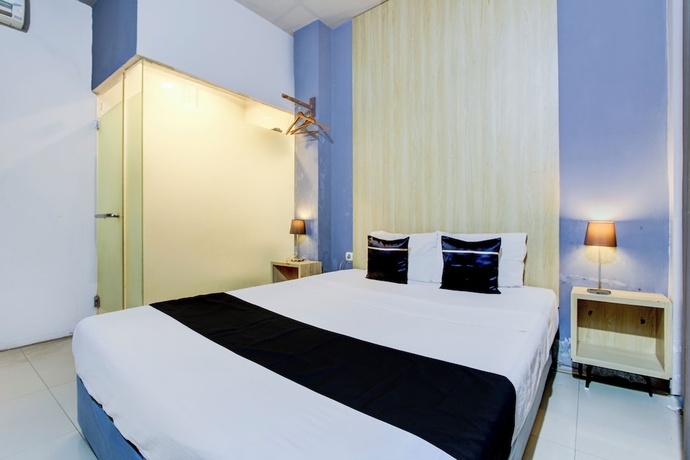 Imagen de la habitación del Hotel O Tegal near near Pacific Mall Tegal formerly Hugo Suites Family. Foto 4