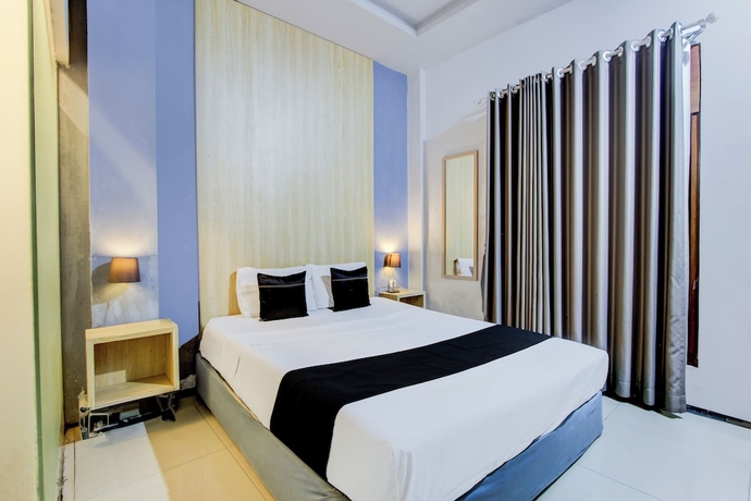 Imagen de la habitación del Hotel O Tegal near near Pacific Mall Tegal formerly Hugo Suites Family. Foto 5
