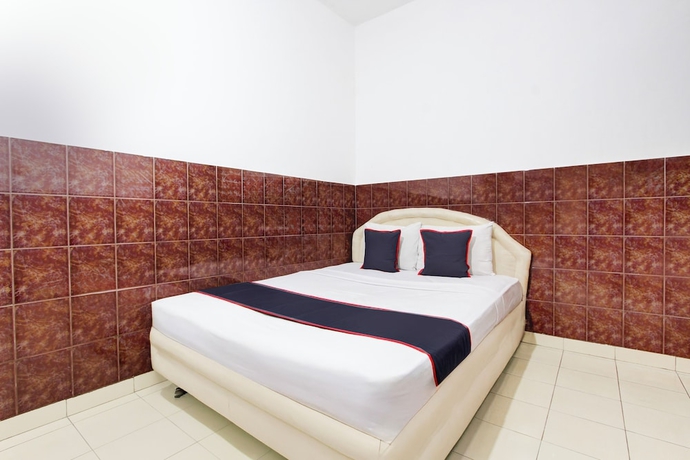 Imagen de la habitación del Hotel O Wisma Hasanah. Foto 4
