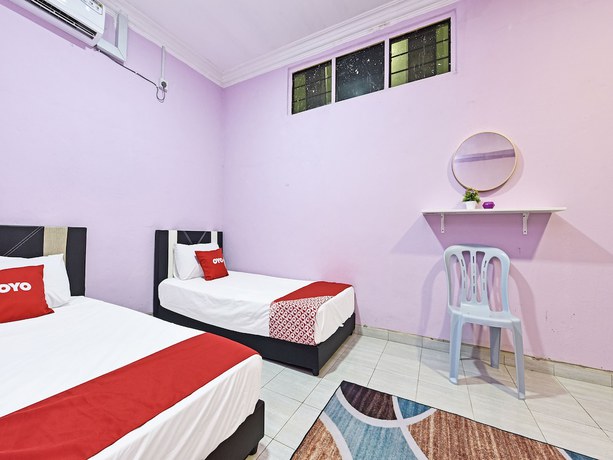 Imagen de la habitación del Hotel O Zn Mix Homestay & Roomstay. Foto 8
