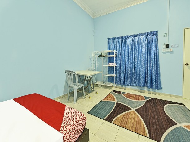 Imagen de la habitación del Hotel O Zn Mix Homestay & Roomstay. Foto 9
