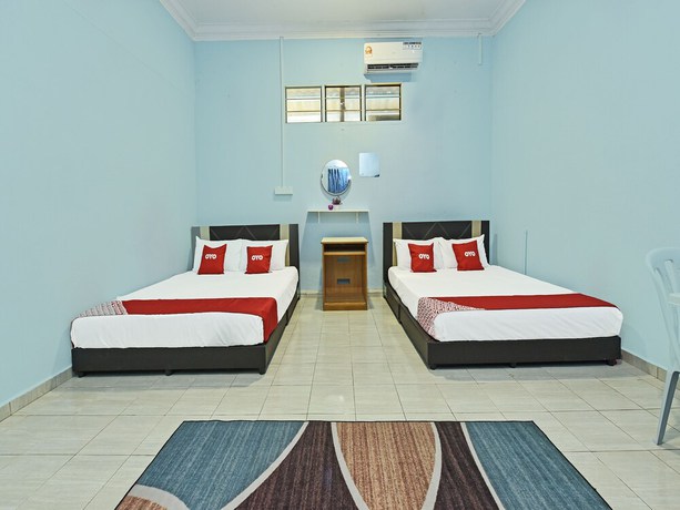 Imagen de la habitación del Hotel O Zn Mix Homestay & Roomstay. Foto 10