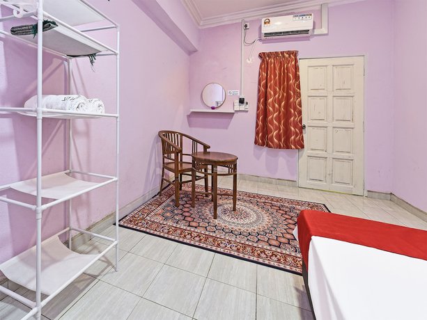 Imagen de la habitación del Hotel O Zn Mix Homestay & Roomstay. Foto 11