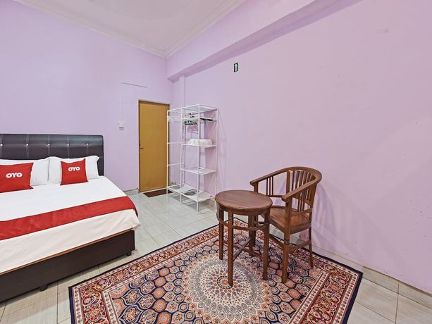 Imagen de la habitación del Hotel O Zn Mix Homestay & Roomstay. Foto 13