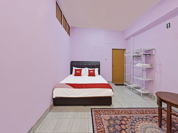 Imagen de la habitación del Hotel O Zn Mix Homestay & Roomstay. Foto 15