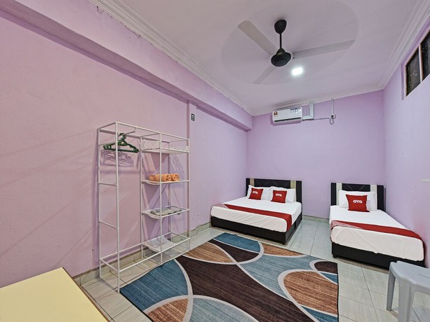Imagen de la habitación del Hotel O Zn Mix Homestay & Roomstay. Foto 16