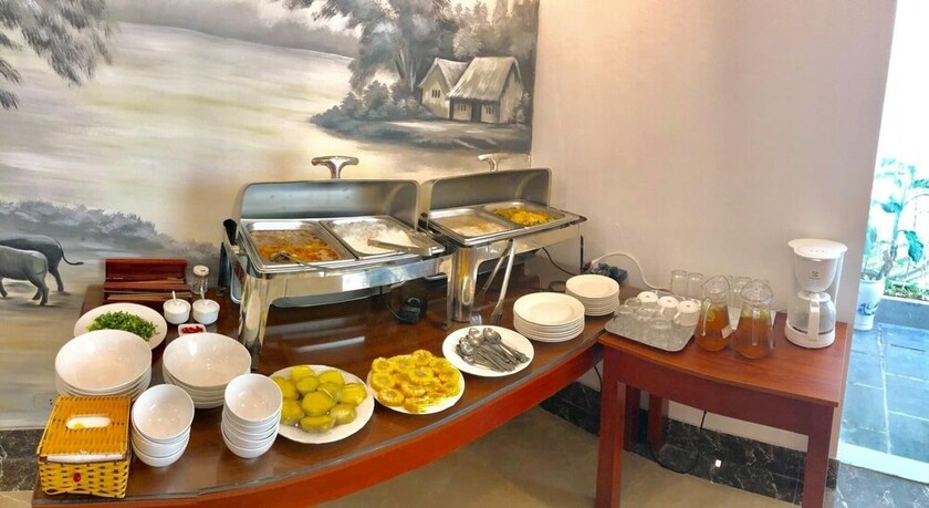 Imagen del bar/restaurante del Hotel O Zoli Home. Foto 14