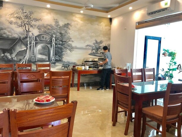 Imagen del bar/restaurante del Hotel O Zoli Home. Foto 16