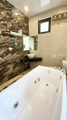 Imagen de la habitación del Hotel O Zoli Home. Foto 20