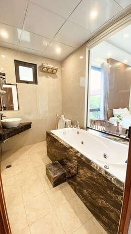 Imagen de la habitación del Hotel O Zoli Home. Foto 32